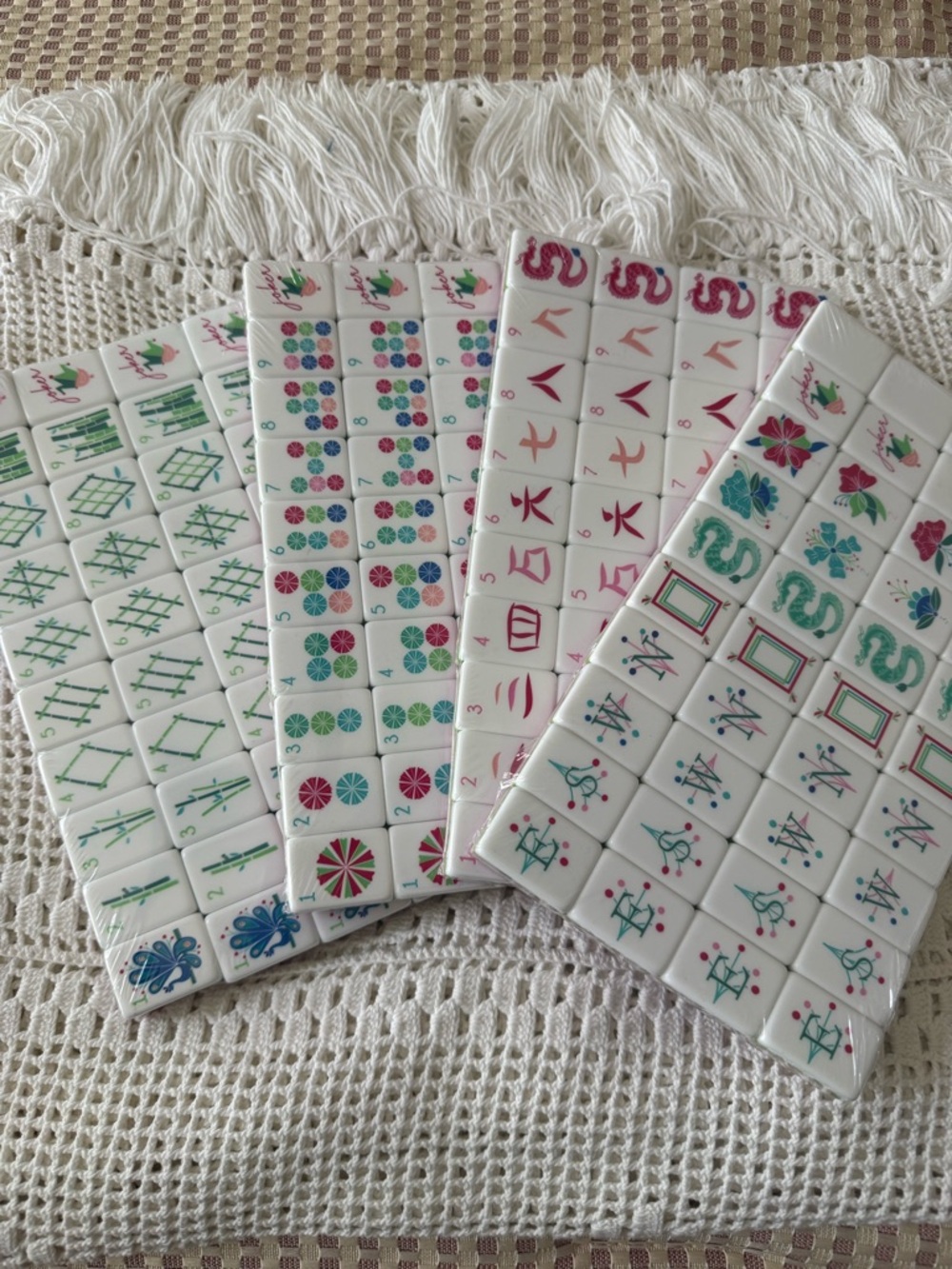 New, sealed mahjong tiles!  Fantastic deal.  Offers welcome.